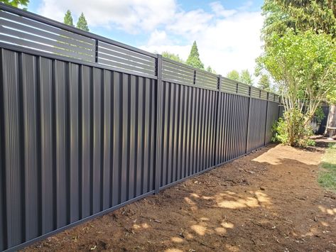 Metal Privacy Fence Colorbond Fence Colorbond Steel Fence in USA PNW Steel Privacy Fence Privacy Panels Corrugated Privacy Fence Sheet Metal Fence Black Fence Gap Free Privacy Fence #steelfence NOT #vinylfence #fence #fencedesign #blackfence #sustainableconstruction #sustainableproducts #durablegoods #hgtv #newhome #privacyscreen #privacyfence #privacy #landscapedesign #landscapedesignideas #landscapearchitecture #designinspo #homeimprovement #newhome #renovation #homeinspo #homedesign Metal Fence Design, Metal Fence Ideas, Sheet Metal Fence, Corrugated Metal Fence, Diy Backyard Fence, Metal Fence Panels, Black Fence, House Fence Design, Privacy Fence Designs