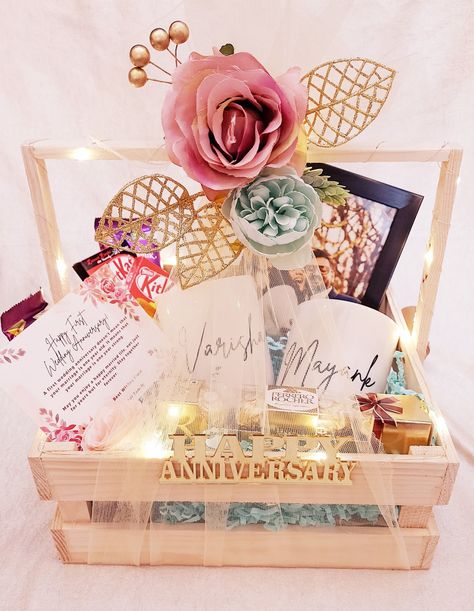 Get beautiful gift hampers and make your loved ones feel special. Shop with Fairy Light Hampers ♥️ We are based out of Mumbai and deliver across India. Customised Gift Hamper for Anniversary! Get gift hampers for all occasions and make your loved ones feel special. Shop with Fairy Light Hampers +91 9819433681 Customised Anniversary Gift, Anniversary Hamper Ideas For Couple, Wooden Hampers Gift Ideas, Wooden Basket Gift Hamper, Valentine Hampers Ideas, Hamper Decoration Ideas Gift, Anniversary Hamper Ideas, Anniversary Gift Hampers, Wooden Gift Hamper