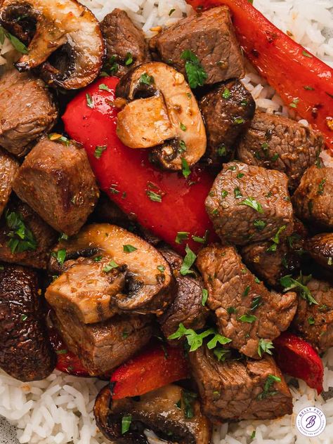 Made with sirloin steak bites, peppers, and mushrooms in a simple but super flavorful marinade, this Air Fryer Steak and Veggies recipe makes a quick and easy all-in-one lunch or weeknight dinner. Bonus, it's high protein and low carb. Air Fryer Steak And Veggies, Air Fryer Steak Bites And Mushrooms, Sirloin Steak Bites, Steak And Green Beans, Steak And Veggies, Mushroom Bites, Peppers And Mushrooms, Ways To Cook Steak, Air Flyer