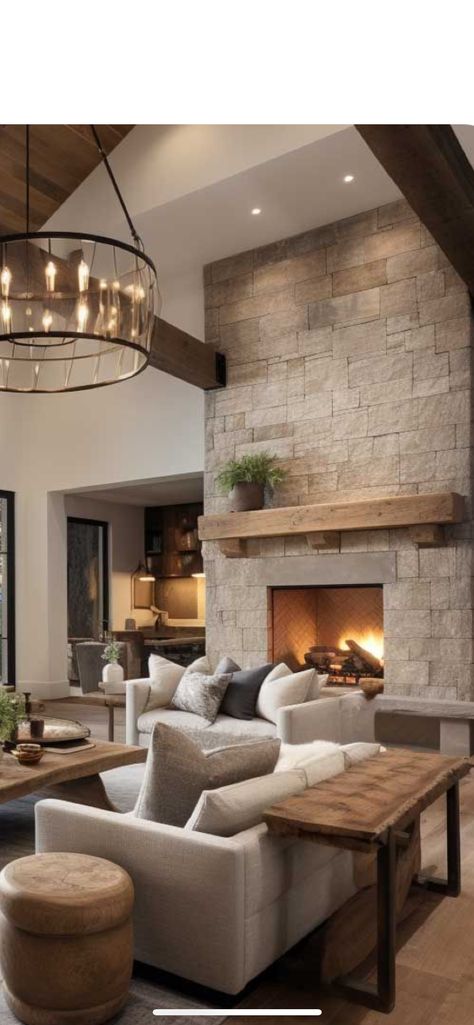 Moody Living Room Stone Fireplace, Living Room With Huge Tv, Flat Front Fireplace, Smooth Stone Fireplace, Living Room Designs With Big Window, Katy Hearn House, Real Wood Fireplace, Bathroom Fireplace Ideas, Indoor Outdoor Fireplace Double Sided