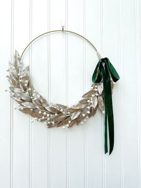 "○ >>ONE READY TO SHIP<< This gold laurel Christmas wreath is perfect for decorating for the holidays, or all winter long!  Hang this wreath with or with out a ribbon to change the way it looks!   ○ This modern Christmas wreath for the front door would also look great inside as a part of your interior decorations. ○ What I like about this gold winter hoop wreath is that it is minimalist and modern yet elegant at the same time.  Since it has a gold color palette it can be used as a New Years wrea Gold Ring Wreath Diy Christmas, Diy Modern Christmas Wreath, Winter Hoop Wreath, Christmas Wreaths For Front Door Elegant Modern, Gold Hoop Christmas Wreath, Hoop Crafts Ideas, Modern Minimalist Christmas Decor, Hoop Wreath Ideas, Gold Ring Wreath