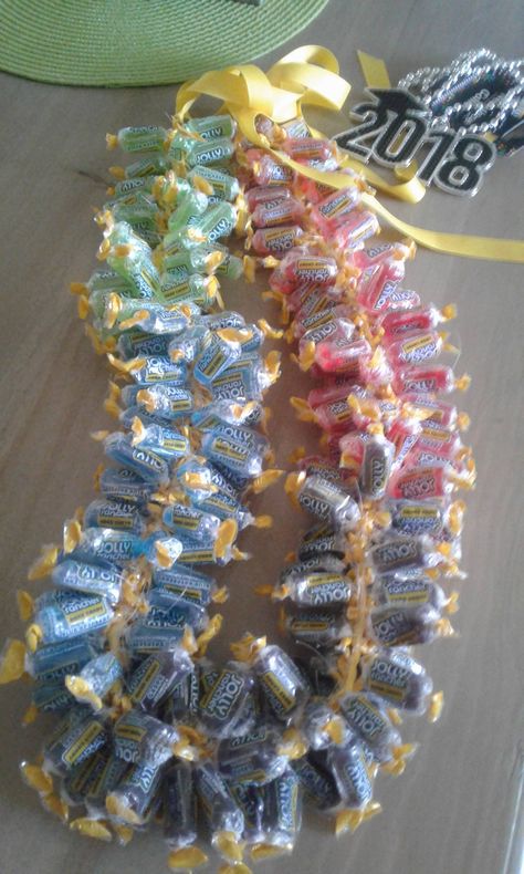 Graduation Lei made with 3 lbs. of Jolly Ranchers! Luau Christmas, April Inspiration, Grad Leis, Graduation Leis Diy, Candy Lei, Jolly Ranchers, Graduation Leis, Jolly Rancher, Graduation Diy