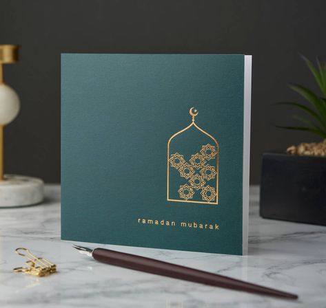 Featuring a delicate geometric patterned arch in gold foil, this Ramadan Mubarak card is from our multi-award winning "Rose & Co" collection. A simply beautiful card to send to family, friends, colleagues or loved ones this Ramadan wishing them a prosperous and blessed month. not given Beautifully designed, printed and gold foiled in the UK on a textured 300 gsm premium Italian board. It is blank inside for your personal message. Ramadan Ads, Ramadan Mubarak Cards, Ramadhan Hampers, Italian Board, Kad Raya, Eid Photography, Ramadan Card, Ramadan Greeting Card, Eid Cake