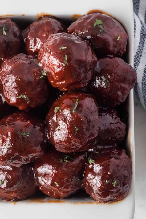 These sweet and savory Grape Jelly Meatballs are an easy appetizer for any occasion. A few simple ingredients - THREE to be exact, and very little prep, make them perfect for holidays and game days! Crockpot Grape Jelly Meatballs, Meatballs Grape Jelly, Meatballs Appetizer, Jelly Meatball Recipe, Cocktail Meatball Recipes, Grape Jelly Meatballs Recipe, Meatballs Crockpot, Jelly Meatballs, Grape Jelly Meatballs