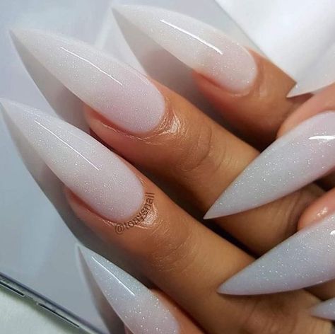 Celebrate the turn of fall to winter with these snowy white nail designs. Stiletto Nail Art Designs, White Stiletto Nails, Acrylic Nails Stiletto, Stiletto Nails Short, Unghie Nail Art, Milky Nails, Stiletto Nail Art, Stiletto Nails Designs, White Nail Designs