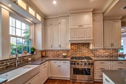 100+ Gorgeous Kitchen Backsplash Ideas | Unique Backsplashes for the Kitchen | HGTV White Cabinets Brick Backsplash Kitchen, Cottage Backsplash Ideas, Gray Countertops, Brick Kitchen Backsplash, Brick Backsplash Kitchen, Hgtv Kitchens, Louisiana Kitchen, Pictures Tips, Brick Kitchen