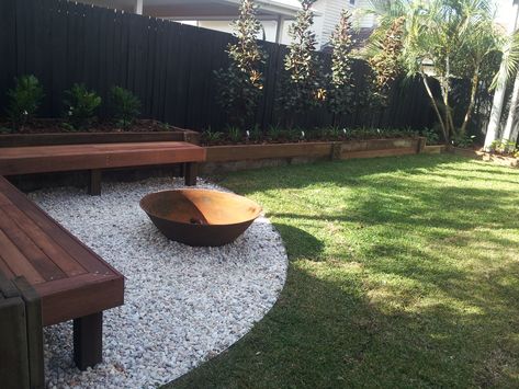 Hardwood timber seat to compliment the surrounding retaining walls. The white gravel helps to highlight the lush turf. Backyard Seating Area, Fire Pit Landscaping, Backyard Seating, Casa Country, Backyard Renovations, Deck Designs, Australian Garden, Diy Backyard Landscaping, Small Backyard Ideas