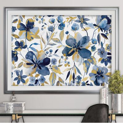 This engaging wall art brings an element of botanical style to your living room, bedroom, or home office. Entitled “Golden Indigo Garden,” this rectangular oil painting is made in the USA and printed on fire-resistant wrapped canvas. It features an array of flowers and leafy stems, all rendered in shades of yellow and blue on a white background. We love that this piece can be hung horizontally or vertically, so you can find just the right place for it in your modern or bohemian home. Format: Sil Gold Living Room, Yellow Living Room, Garden Print, Blue Wall Art, Canvas Paper, Yellow And Blue, Painted Pumpkins, Blue Walls, Bohemian Home