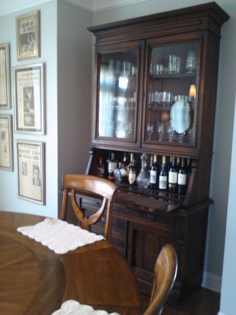 repurposed secretary desk from my great aunt (a missionary)...we made it into a nice bar! Secretary Desk As Bar, Antique Secretary Bar Cabinet, Secretary Desk Bar, Repurposed Secretary Desk, Hutch Bar, Liquor Bar Cabinet, Bar Hutch, Secretary Desk With Hutch, Desk Bar