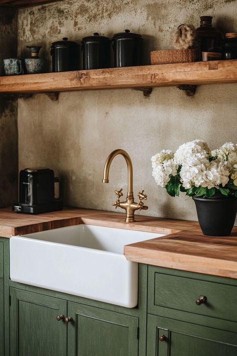 Discover the latest kitchen design featuring rustic wooden countertops, elegant brass fixtures, and open shelving. This beautiful setup combines functionality with classic aesthetics. Perfect for those seeking a cozy and stylish kitchen update. 🌿🏡 #KitchenDesign #HomeDecor #RusticCharm Kitchen Wooden Countertops, Wooden Kitchen Countertops, 60s Ranch, Rustic Kitchen Countertops, Wooden Countertops Kitchen, Classic English Kitchen, Earthy Kitchen, Timeless Kitchen Design, Hall Entrance