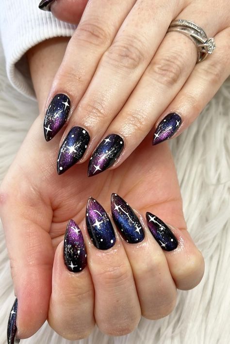 29 Galaxy Nail Art Designs to Shine in 2024: Cosmic Ideas for Stunning Nails Black And Purple Galaxy Nails, Nail Art Themes Ideas, Galaxy Gel Nail Designs, Starry Night Prom Nails, Galaxy Nails Designs, Space Nails Galaxy, Space Themed Nails, Astrology Nails, Nail Art Galaxy