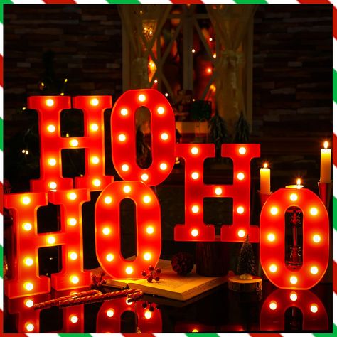 PRICES MAY VARY. Stunning Red Color and Package Contents: adding a pop of color to your holiday decorations, these ho ho ho Christmas decorations come in a vibrant and celebratory red color; Each package includes 6 of these stunning light fixtures, 3 with the letter H and 3 O's; The red trim outline further enhances their visual appeal, adding a fun twist to traditional Christmas lights Exquisite Material and Compact Design: crafted from quality plastic material, these Christmas garage decoratio Red And White Lights Outside, Christmas Bar Decorations, Ho Ho Ho Sign, Led Letter Lights, Christmas Garage, Letter Lights, Red Christmas Decor, Decoration Lights, Light Up Letters