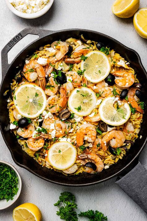 Looking for an easy weeknight dinner? One-pot Shrimp with Orzo is full of juicy shrimp, feta cheese, lemon, garlic, and black olives. It’s a hearty, festive, mouthwatering dish that’s super simple to make! Shrimp With Orzo, Dinner One Pot, One Pot Shrimp, Shrimp Orzo, Roasted Potatoes And Carrots, Potted Shrimp, Dinner Favorites, Leafy Salad, Juicy Shrimp