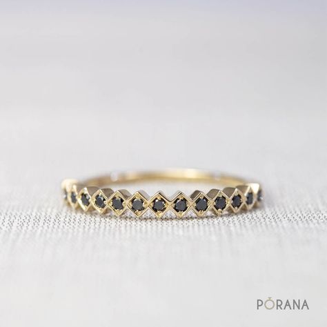 This sophisticated ring from our award winning design collection 'WEAVE', inspired by woven basketry, features a unique pattern of round black diamonds, which can stack with other rings in the collection to create your own woven pattern style. [R0032B] ✦ 14# Black Diamonds, round cut, total carat weight 0.15 (half circle ring) ✦ Natural Black Diamond, AAA quality ✦ Ring width: 2.5mm, height: 1.8mm ✦ Metal available: 14K and 18K solid gold (white gold, rose gold, yellow gold) and Platinum950. Please select from the drop down menu ✦ Ring sizes available 3-8. Please add ring size in Note when order. (other sizes than this please contact me) ⌘ Eternity and ¾ band are also available, please message ring size and metal you want for quotation. ⌘ WEAVE collection receives DEmark (Design Excellence Black Diamond Band Ring, Black Diamond Band, Bvlgari Bracelet, Baguette Diamond Wedding Band, Black Diamond Bands, Stackable Rings Wedding, Dark Jewelry, Cute Engagement Rings, Diamond Band Ring