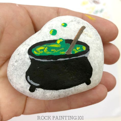 Witch And Cauldron Painting, Spooky Painted Rocks, Cauldron Painting Ideas, Rock Painting Step By Step, Halloween Rock Painting Ideas Easy, Halloween Painted Rocks Ideas, Cauldron Painting, Halloween Stones, Halloween Rock Painting Ideas