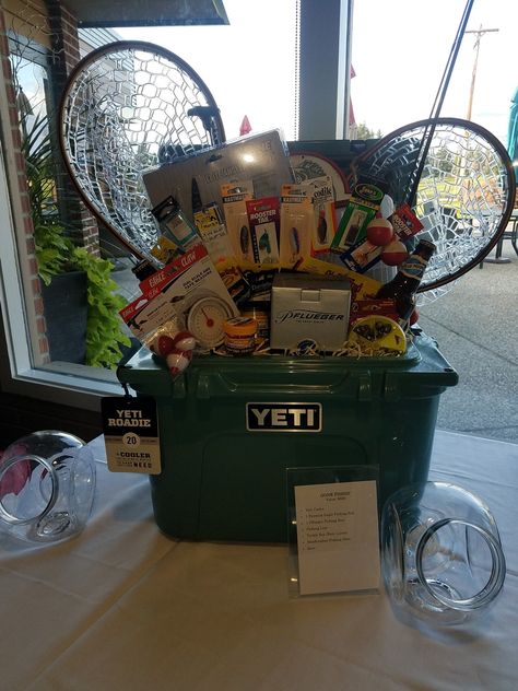 Western Silent Auction Ideas, Creative Silent Auction Ideas, Gone Fishing Gift Basket Ideas, Cooler Gift Basket Ideas Wedding, Cooler Silent Auction Basket, Big Raffle Prize Ideas, Wedding Social Prizes, Yeti Cooler Raffle Basket Ideas, Fishing Raffle Basket Ideas