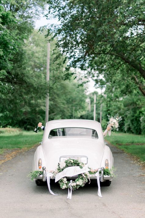 Sophisticated and refined, this Rhode Island manor wedding is all sorts of wonderful. Neutral wedding colors, greenery garlands and a vintage getaway car - we were sold pretty darn fast. And THEN we found out this is the same place the Kennedys were married! How bout this pinworthy wedding exit pictured here? More goodness on #ruffledblog! Vintage Getaway Car, Cars Wedding, Wedding Getaway Car, The Kennedys, Car Wedding, Wedding Car Decorations, Wedding Exit, Neutral Wedding Colors, Newport Wedding