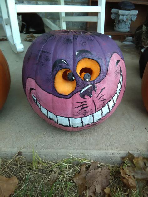 Pumpkin Carving 2016 by: bunniesbysarah Cheshire Cat Pumpkin Painting, Cat Painted Pumpkin, Cat Pumpkin Painting, Cheshire Cat Pumpkin, Pumpkin Designs Painted, Story Book Pumpkin, Pumpkin Paint, Fall Family Fun, Painting Pumpkins