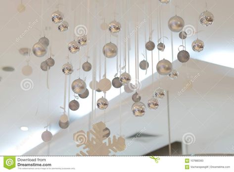 Silver Baubles Hang From Ceiling With Snowflake For Decorate Stock Image - Image of holiday, baubles: 107680383 Hanging Ornaments From Ceiling, Decorate Ceiling, Balloon Centerpieces Diy, Hang From Ceiling, Christmas Present Decoration, Metallic Ornaments, Floating Ornaments, Christmas Balloon Decorations, Silver Baubles