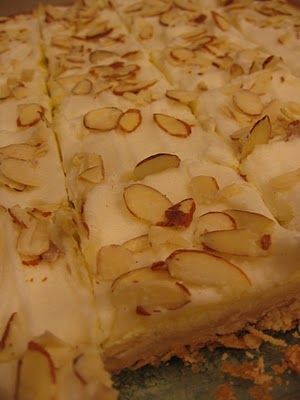 Almond Bars: The first layer is a rich buttery crust, then the creamy almond cheesecake layer, and the last is the almond flavored frosting with sliced almonds on top of that. Altogether it's fabulous! Almond Cheesecake, Flavored Frosting, Cheesecake Layer, Almond Pastry, Almond Bars, No Bake Bars, Almond Flavor, Cake Bars, Soften Cream Cheese