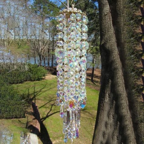 PRICES MAY VARY. 【Versatile Garden Decor】Its wind chime style adds a soothing and melodic sound to your outdoor space, while its crystal prism hanging design adds a touch of elegance and grace. 【Handmade with Love】Each of our Wind Chimes is handmade with love and attention to detail. Add a touch of handmade charm to your home with our Handmade Sun Catchers Hanging Decor. 【Unique Design】Our Crystal Wind Chime is a one-of-a-kind piece, featuring a stunning combination of crystals and wind chimes. Outdoor Wind Chimes, Journal Covers Diy, Tree Curtains, Unique Wind Chime, Crystal Wind Chimes, Glass Wind Chimes, Crystal Suncatcher, Baby Rooms, Beads Chain