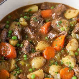 Beef Stew with Stewing Beef, Flour, Garlic Powder, Salt, Black Pepper, Olive Oil, Red Wine, Beef Broth, Tomato Paste, Dried Rosemary, Potatoes, Carrots, Celery Stalks, Peas, Cornstarch, Water. Easy Beef Stew Recipe, Easy Beef Stew, Pizza Roll, Pot Beef Stew, Lamb Stew, Spend With Pennies, Beef Stew Recipe, Stew Recipe, Recipes From Heaven