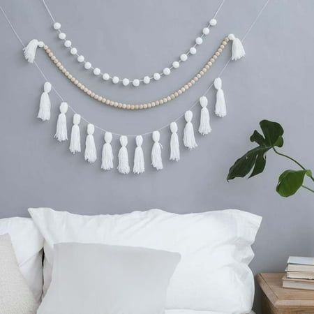 Boho Tassel Garland Tassel Wall Hanging Decor Tassel Banner and 56 Wood Beads and 20 white Balls Garlands for School Classroom Baby Shower Features: Material: cotton Product color: white Product size:20x8x5cm/7.87x3.14x1.96ins Packing size:22x20x5cm/8.66x7.87x1.96ins Net weight 240g/0.52lb Gross weight:250g/0.55lb Product Description: Perfect Size Boho Garland There are 12 tassels and measures 39.37 inches strung, 56 wood bead and measures 27.55 inches. 20 white pompom measures 78.74 inches.suff Teaching Decor, Boho Tassel Garland, Tassel Mobile, Boho Garland, Tassel Banner, Tassel Wall Hanging, Boho Party Decorations, Tassel Wall, Lantern Decor