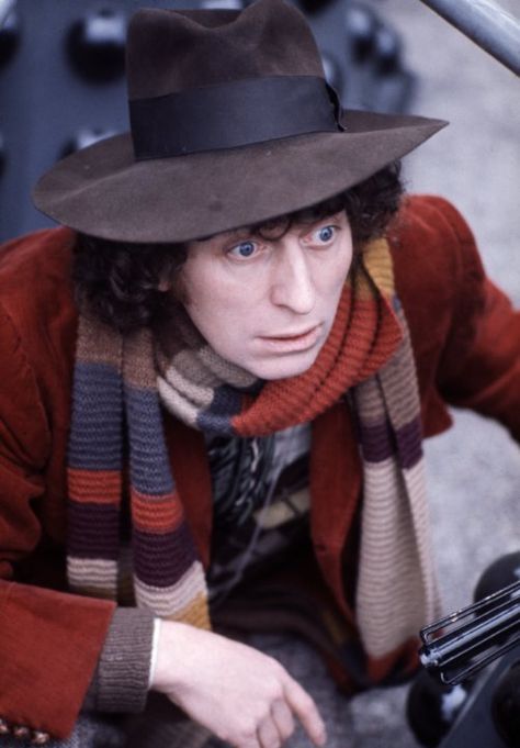 British actor Tom Baker in his best-known role as Dr Who, between two of his arch enemies, the Daleks at BBC TV Centre, London, 1974. Dr Who Tom Baker, Happy 85th Birthday, Fourth Doctor, Tom Baker, 4th Doctor, Classic Doctor Who, Red Wool Coat, 13th Doctor, Good Doctor