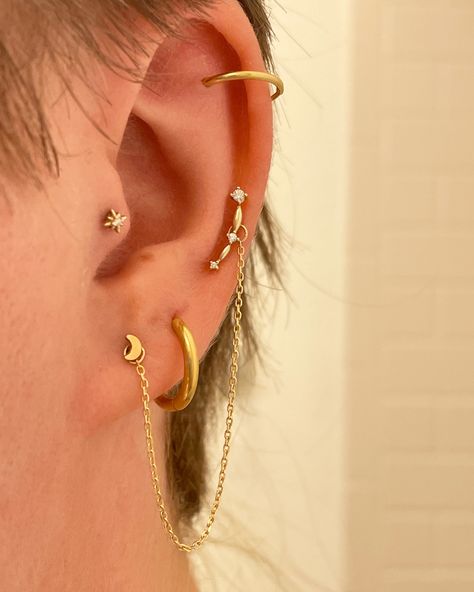 This is a close up of different ear piercings with solid gold jewelry Earring Curation Gold, Golden Piercings Ear, Ear Piercing Curation Gold, Gold Ear Curation, Gold Earrings Aesthetic, Ear Designs, Hiker Girl, Piercing Inspiration, Ear Curation