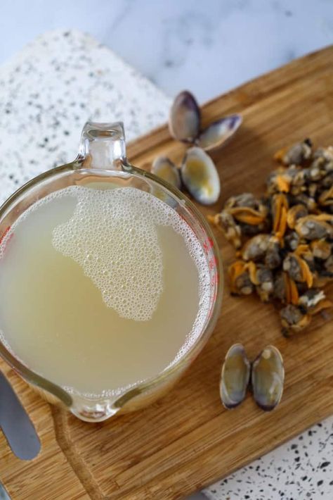 Learn how to make the BEST clam juice recipe from fresh clams instead of using the salty bottled stuff from the grocery store. We give you a clam broth recipe and tips and tricks for easily making your own clam nectar at home in less than 20 minutes. It’s a WHOLE LOTTA YUM! ✅ Get... Read On → The post Clam Juice Recipe appeared first on Whole Lotta Yum. Clam Juice Recipes, Whole Lotta Yum, Fresh Clams, Seafood Sushi, Stock Recipes, Seafood Stew, Healthiest Seafood, Clam Recipes, Cod Recipes