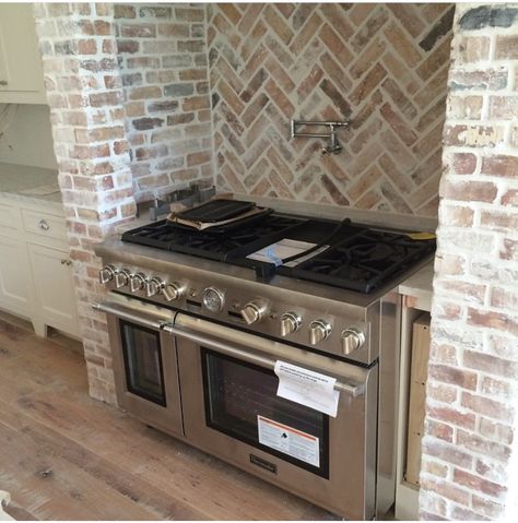 Never have to carry another pot of water to the stove? Sign me up Thermador Range, White Washed Brick, Stairway Wall, Brick Farmhouse, Kitchen Stone, White Wash Brick, Brick Kitchen, Kitchen Hood, Coastal Contemporary