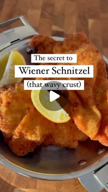 Astrid Lamarche | Austrian Bakery in San Diego on Instagram: "5 essential things for the perfect Schnitzel A real Wiener Schnitzel is quite simple and tricky at the same time. You need meat (veal is the original Wiener Schnitzel), salt, pepper, flour, eggs, breadcrumbs, clarified butter, and a pan. But there’s more to it: 1. A good frying pan is essential. It should have a thick bottom which distributes the heat evenly. Cristel’s Casteline frying pan used here has great heat diffusion. It also comes with a detachable handle that you can switch with side handles. (See discount code info below 😍) 2. The ultimate secret for the wavy crust: dip the pounded Schnitzel in minimal water on both sides. The water will be encased in the breading and once in the pan, the resulting steam will produ Wiener Schnitzel Recipe, Schnitzel Recipe, Veal Cutlet, Wiener Schnitzel, Clarified Butter, Polish Recipes, Cooking School, German Food, Frying Pan