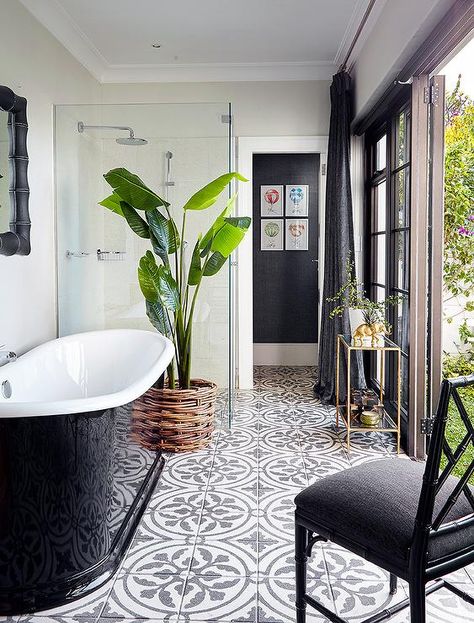 Black and white bathroom features a glossy black freestanding tub atop a black and white concrete tile floor which continues into the seamless glass glass shower which is placed next to the tub. White Concrete Floors, Concrete Tile Floor, Interior Design Minimalist, Bad Inspiration, Room Tiles, Outdoor Bathrooms, Basement Bathroom, Trendy Bathroom, Tile Flooring