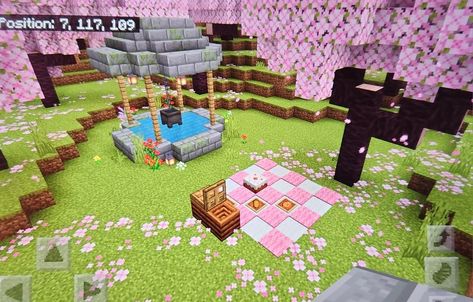 cottagecore wishing well & picnic area under the cherry blossom trees 🌸🩷 Cherry Blossom Picnic Minecraft, Cute Well Minecraft, Cherry Tree Minecraft Ideas, Cherry Blossom Well Minecraft, Minecraft Cherry Bedroom, Cherry Blossom Pathway Minecraft, Cherry Blossom Storage Room Minecraft, Picnic Area Minecraft, Cherry Blossom Minecraft Pallet