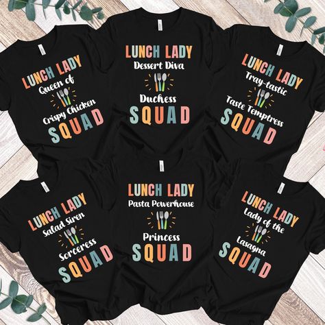 Elevate your lunch lady squad's style with our customizable Lunch Lady T-Shirts! Now, you can showcase your unique team spirit with personalized nicknames. Crafted from high-quality materials for comfort and durability, these tees are the perfect way to unite your lunchroom crew in style. Whether you're the "Pasta Powerhouse Princess" or the "Queen of Crispy Chicken," our personalization option allows you to create shirts that reflect your team's personality and camaraderie. Stand out from the c School Lunch Lady, Lunch Lady, Staff Gifts, Lunch Room, Team Shirt, Create Shirts, Crispy Chicken, School Lunch, Team Shirts