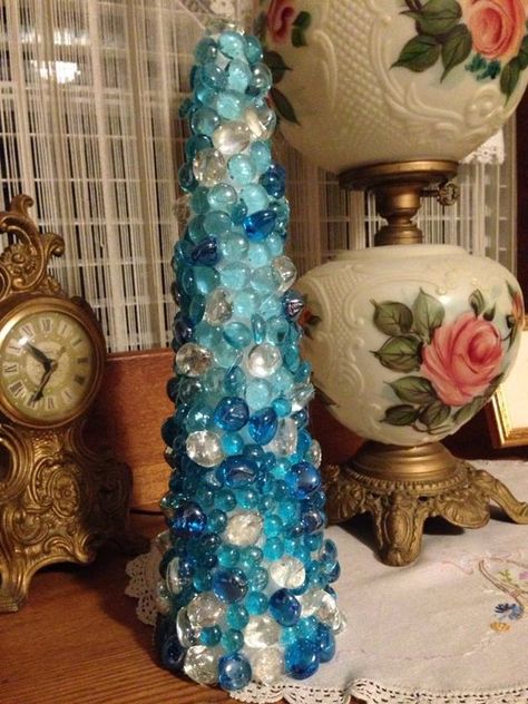 dollar store glass pebbles makes a christmas tree, christmas decorations, crafts, seasonal holiday decor, Glass stone Christmas Tree Frozen Christmas Tree, Glass Bead Crafts, Christmas Beach, Cone Crafts, Glass Pebbles, Frozen Christmas, Gem Crafts, Cone Christmas Trees, Christmas Board