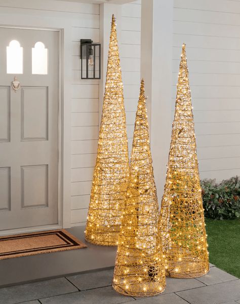 15 Holiday Decor Pieces That'll Take You From Fall Through Christmas Large Outdoor Christmas Decorations, Christmas Lawn Decorations, Christmas Decoration Storage, Christmas Light Show, Outside Christmas Decorations, Cone Trees, Christmas Yard Decorations, Large Tree, Christmas Yard