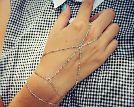 30 Unique Slave Bracelets & Chain Ring Bracelets You Can Buy Finger Ring Bracelet, Hand Chain Jewelry, Finger Bracelets, Hand Chain Bracelet, Cotton Bracelet, Ring Bracelet Chain, Free People Jewelry, Hand Accessories, Silver Plated Bracelet