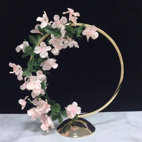 Hoop Centerpiece Stand Metal Floral Hoop Wedding Decor Size:20 Inch TallRUSTIC AND VINTAGE CENTERPIECES: (FLOWER IS NOT INCLUDED) Height 16'', Circle Diameter 13.8''. Comes with modern style, it is gorgeous and makes your weddings, parties beautiful and unique. HIGH QUALITY METAL: The flower stand is made of high quality metal material which are durable and stable. Hoop Wedding Decor, Floral Hoop Wedding, Hoop Centerpiece, Centerpiece Stand, Wedding Vase Centerpieces, Centerpiece Vase, Metal Wedding Arch, Felt Flower Wreaths, Vintage Centerpieces