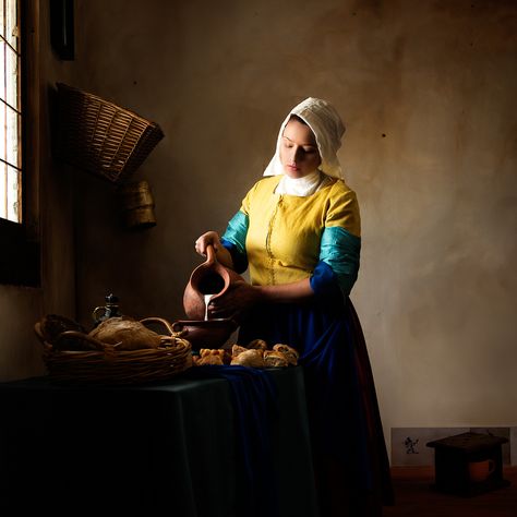 https://flic.kr/p/FHe52j | Woman Pouring Milk | Woman Pouring Milk | © Dennis Ramos  A project recreating some of the iconic paintings of Johannes Vermeer through the camera lens. This image recreates the painting "The Milkmaid".  Photography and Editing: Dennis Ramos Photographers: Michael Sheehan, Myra Baldwin Thiessen Production Designer: Myra Baldwin Thiessen Stylist Designer: Tina French Serneels Makeup and Model: Jessica Lynn Kisiel Location: Myra Studio  Facebook | Website |... The Milkmaid, Iconic Paintings, Johannes Vermeer, Tableau Art, Dutch Artists, Classical Art, Paper Artist, Rembrandt, Professional Photo