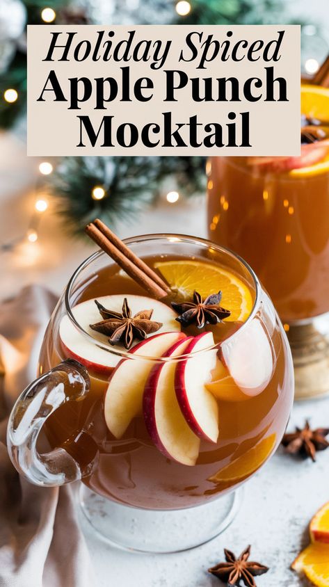 "Discover the perfect Holiday Mocktail with our delicious Spiced Apple Punch recipe! This refreshing non-alcoholic drink is ideal for any festive gathering, making it one of the best fall drink ideas for your next celebration. Impress your guests with this easy-to-make festive beverage recipe that fits seamlessly into your holiday party recipes. Enjoy the warm flavors of fall in every sip!" Christmas Party Drinks Alcohol, Fun Christmas Cocktails, Fun Christmas Drinks, Punch Mocktail, Best Mocktail Recipe, Apple Punch, Holiday Mocktail, Apple Cider Punch, Christmas Mocktails