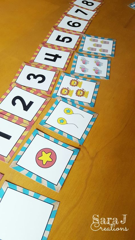 Matching numbers and the circus pictures that show the same amount. Circus Week, Preschool Circus, Circus Pictures, Shape Matching Game, Vintage Circus Party, Counting Practice, Vintage Halloween Photos, Preschool Units, Matching Numbers