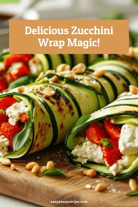 Zucchini wraps filled with roasted red peppers, feta cheese, and fresh herbs on a wooden board. Zucchini Wraps Recipes, Vegetable Lunch, Wraps Recipes, Easy Zucchini Recipes, Easy Peasy Recipes, Wrap Recipe, Flavorful Vegetables, Healthy Zucchini, Easy Zucchini