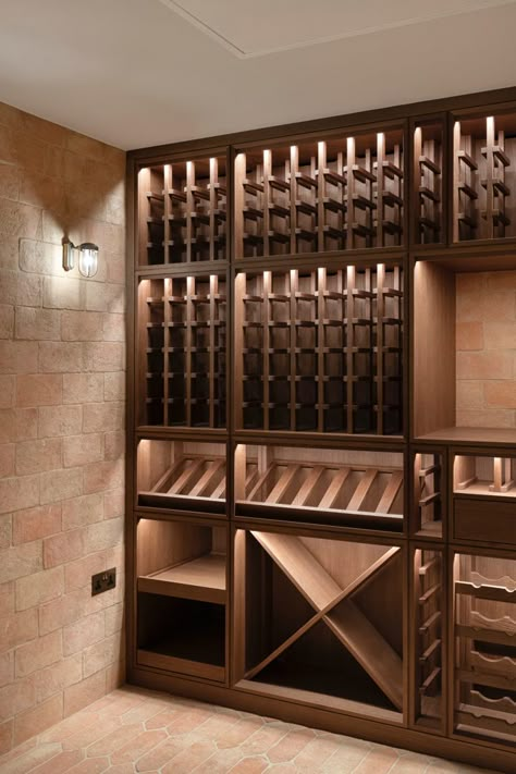 Sip, savor, and indulge in the ultimate wine experience with our bespoke joinery design in our clients wine cellar. A beautiful wine cellar tailored to our client’s vision, combines luxury and functionality in one seamless design. From rich wood textures to intricate details, this space is a true masterpiece thay will leave wine lovers in awe. Cottage Wine Cellar, Small Closet Wine Cellar Ideas, Small Wine Cellar Ideas, Bar In Home, Small Wine Cellar, Unique Wine Cellar, Basement Wine Cellar, Wine Cellar Wall, Wine Room Ideas