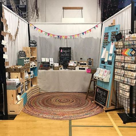 10x10 booth with pipe and drape, crates, gridwall, metal magnetic shutter doors, round rug    #Regram via @www.instagram.com 10x10 Craft Booth Display Ideas, Fair Booth Display Ideas, Fall Festival Booth, Vendor Booth Display Ideas, Booth Display Ideas, Craft Booths, Garage Sale Tips, Vendor Booth Display, Farmers Market Display