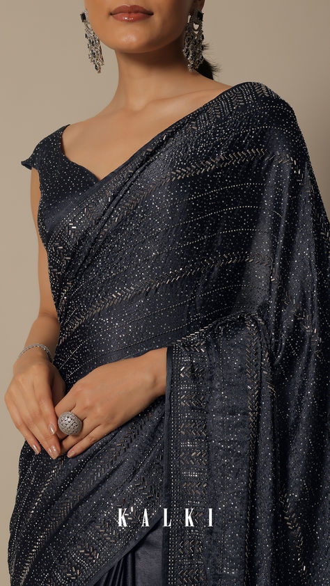 "Step into sophistication with our Swarovski Stone Studded Grey Satin Saree. It is a luxe choice for cocktail and party wear. This embellished saree in subtle stone grey tones exudes understated opulence. It comes with an unstitched blouse for a complete ensemble. " Grey Satin Saree, Embellished Saree, Yumna Zaidi, Kalki Fashion, Saree Design, Satin Saree, Swarovski Stones, Stone Grey, Stone Studs