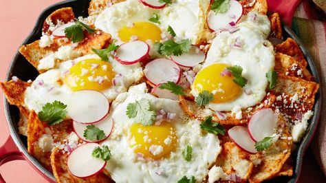 Tortilla Chip Chilaquiles with Hugo Sanchez Red Chilaquiles Recipe, Baked Corn Tortillas, Chilaquiles Recipe, Tortilla Chip, Mexican Breakfast Recipes, Baked Corn, Food Network Magazine, Canned Tomato Sauce, Cast Iron Skillet