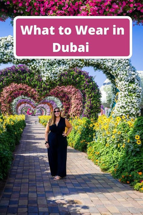 Hannah standing in Dubai miracle gardens with banner text reading what to wear in Dubai Dubai Outfits Ideas Curvy, Dubai Miracle Garden Outfit Ideas, Dubai Womens Fashion, Dubai Attire For Women, Nails For Dubai Vacation, Modest Dubai Outfits Ideas, What To Wear In Dubai Outfits Vacations, Dubai Tourist Outfit, How To Dress In Dubai