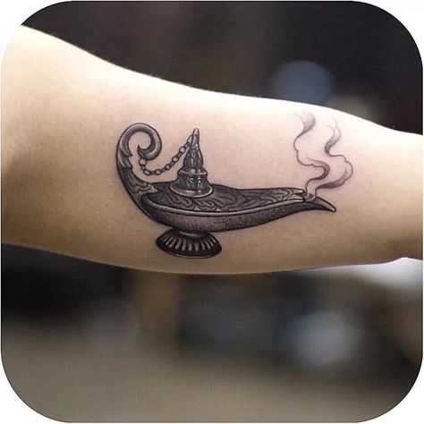 Genie Lamp Tattoo, Genie Tattoo, Fairy Tale Tattoo, Beauty And The Beast Tattoo, Tattoo Sleeve Filler, Lamp Tattoo, Tatuagem Masculina Pequena, Peacock Feather Tattoo, Bottle Tattoo