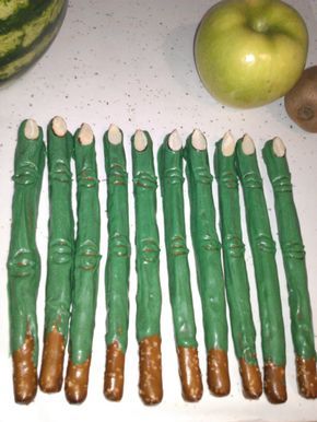 "Zombie Fingers" are actually pretzel rods covered in white chocolate. This is another borrowed idea that was originally presented as witch fingers but this worked great for my Walking Dead party. One guy wouldn't eat them because he thought they were asparagus! Zombie Themed Food, Skull Afghan, Walking Dead Birthday Party, Party Food Ideas For Kids, Walking Dead Party, Birthday Party Food Ideas, Witch Fingers, Zombie Food, Food Ideas For Kids